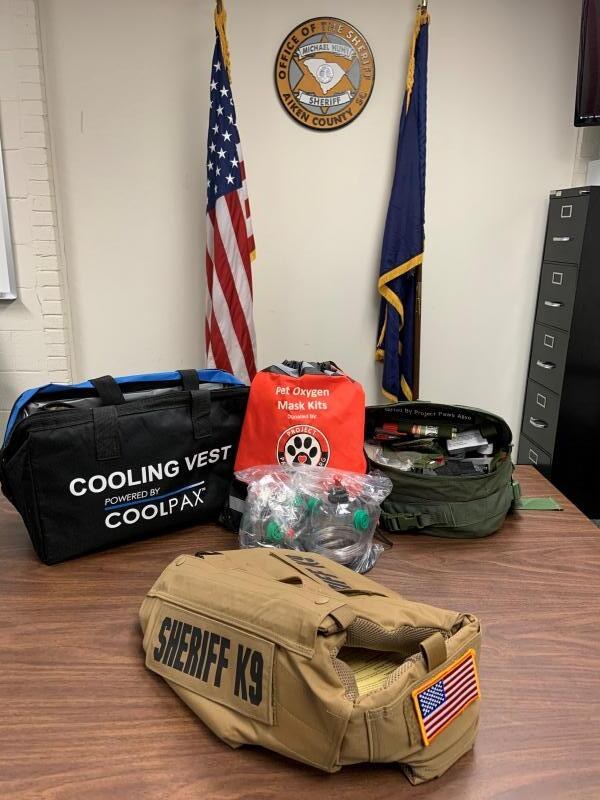 Cooling vest, oxygen mask kits, and Sheriff K9 gear donated by Project Paws Alive